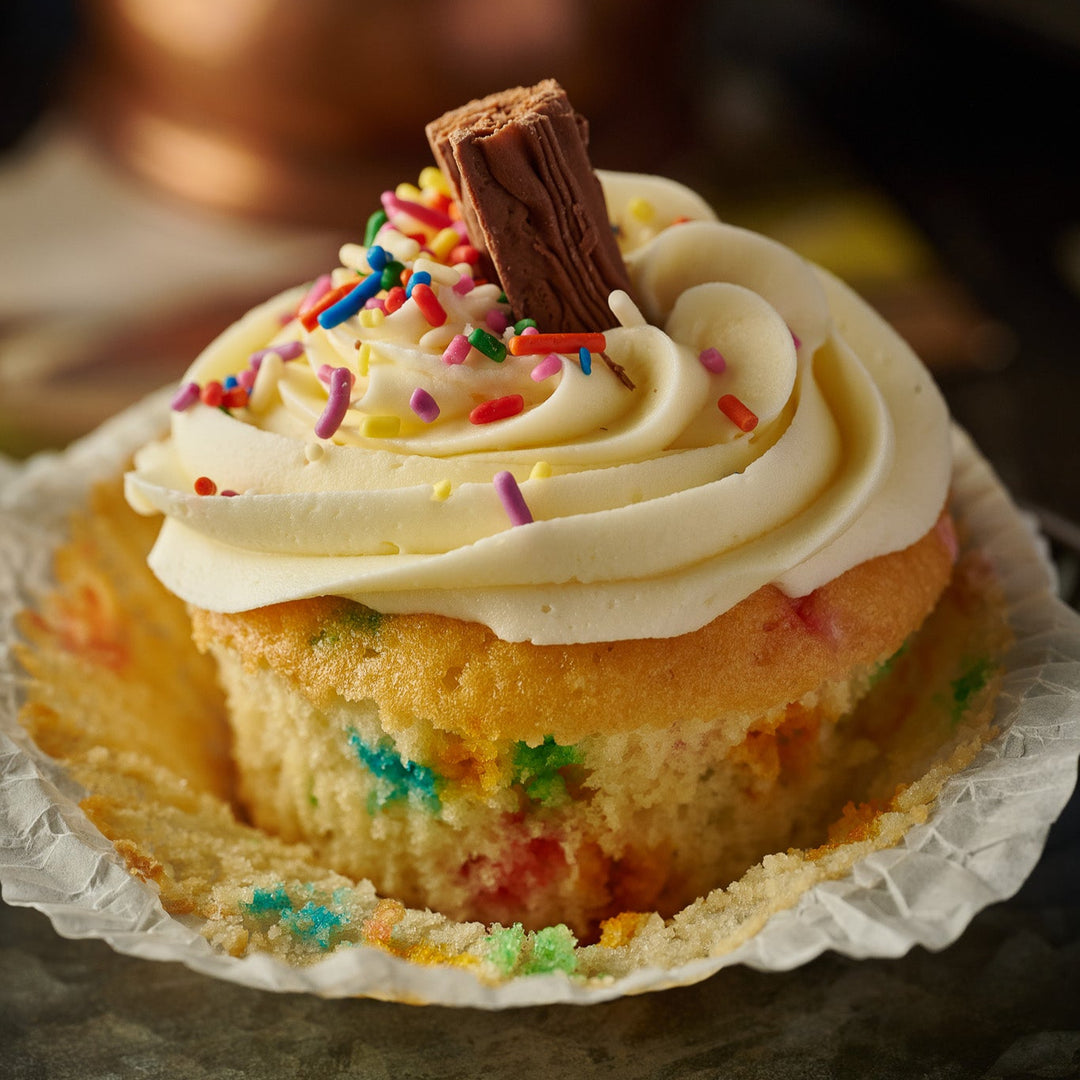 Artisan Birthday Cupcakes- Box of 6. Vanilla Sponge with Sprinkles topped with Rich Frosting.