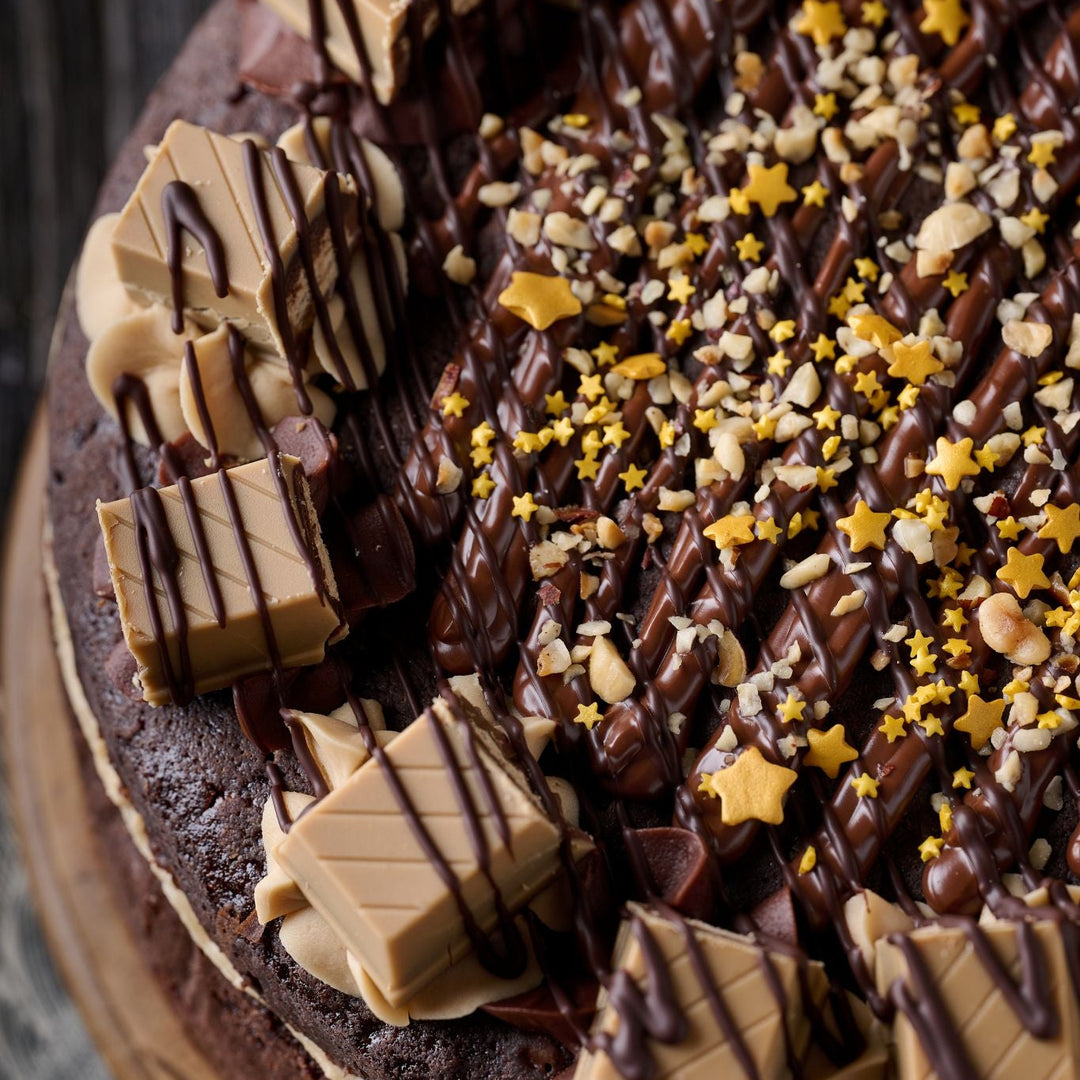 hazelnut gold bar cake with hazelnut drizzle and gold stars