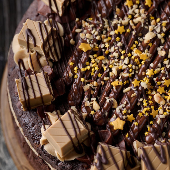 hazelnut gold bar cake with hazelnut drizzle and gold stars