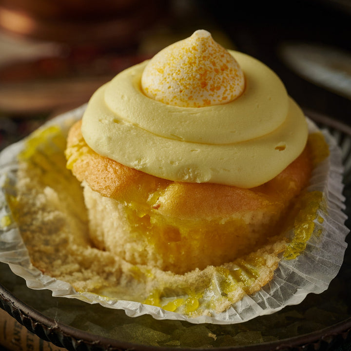 Indulgent Lemon Cupcakes with a Lemon Meringue Kiss 
